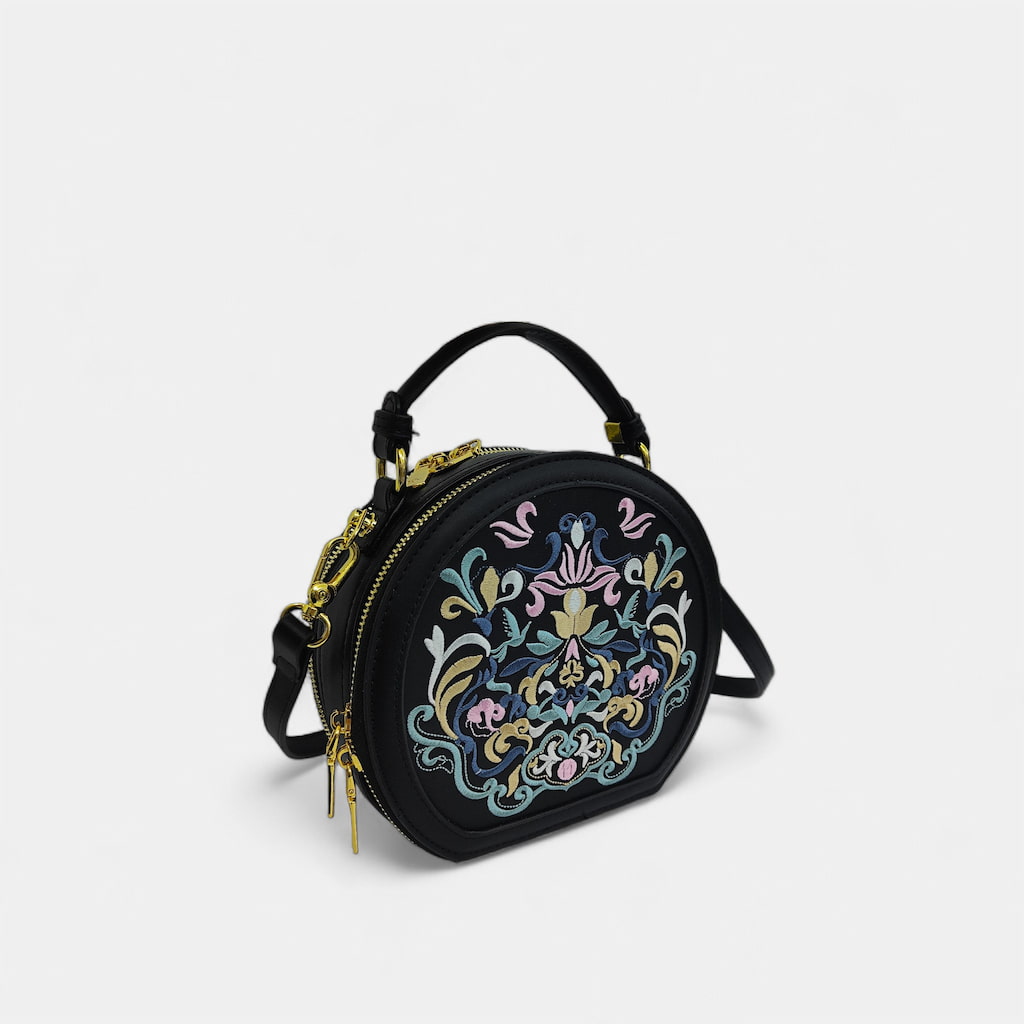 Chinese-vintage-interlock-branch-embroidered-crossbody-circle-bag-PU-leather-left-front
