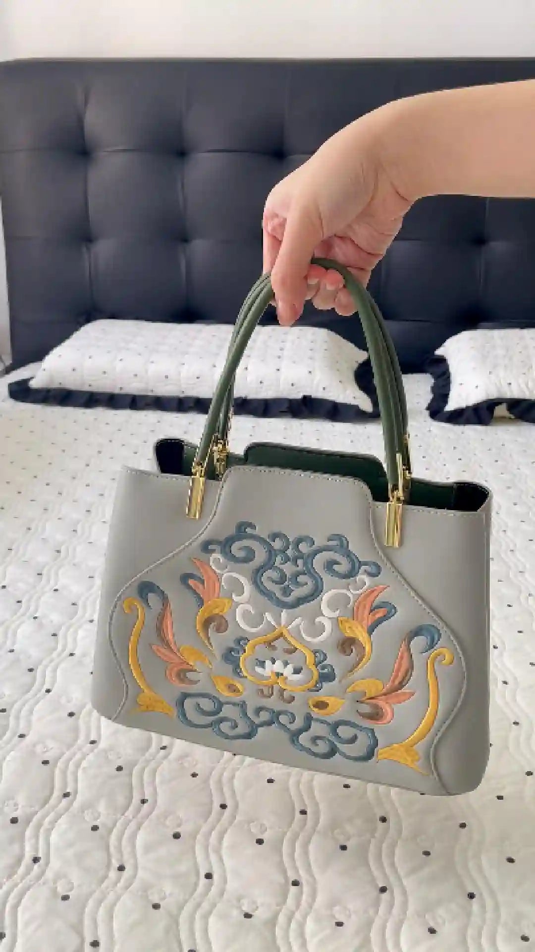 Load video: showcase an embroidered crossbody bag