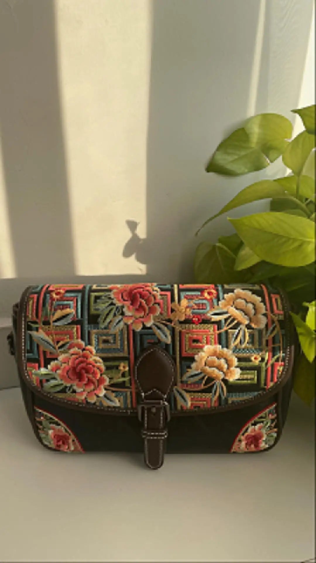 Load video: showcase an embroidered bag
