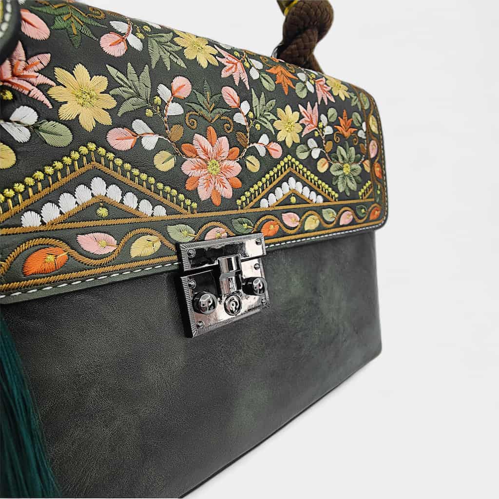 floral-embroidered-message-bag-PU-leather-with-top-handle-and-tassels-left-front