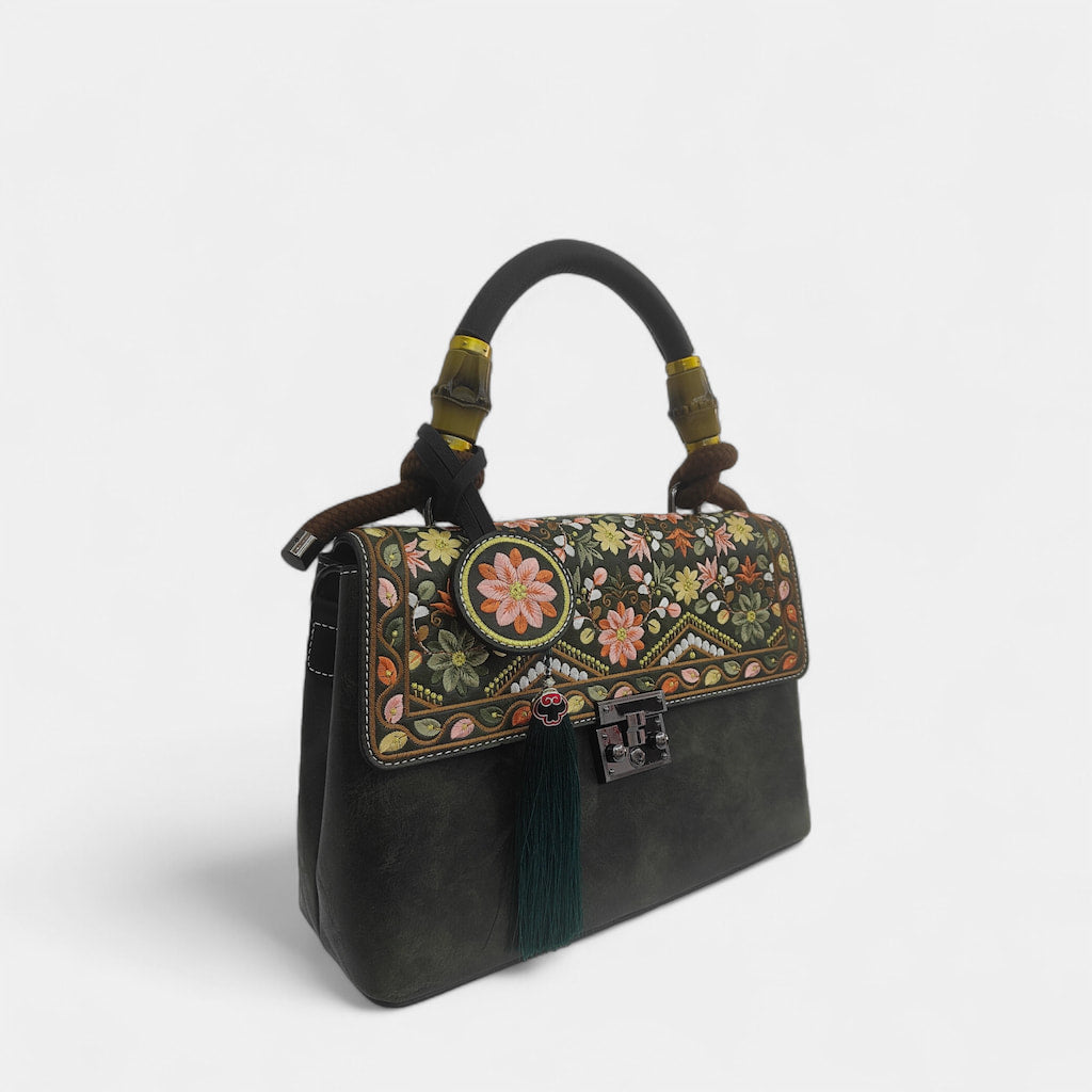 floral-embroidered-message-bag-PU-leather-with-top-handle-and-tassels-left