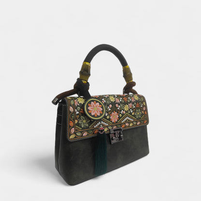 floral-embroidered-message-bag-PU-leather-with-top-handle-and-tassels-left