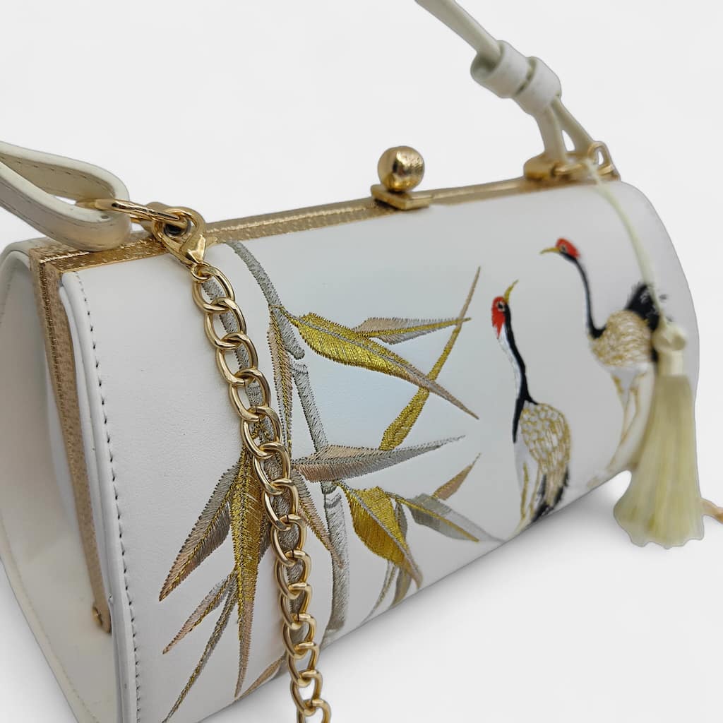 vintage-crane-embroidered-women-barrel-bag-with-tassels-chain