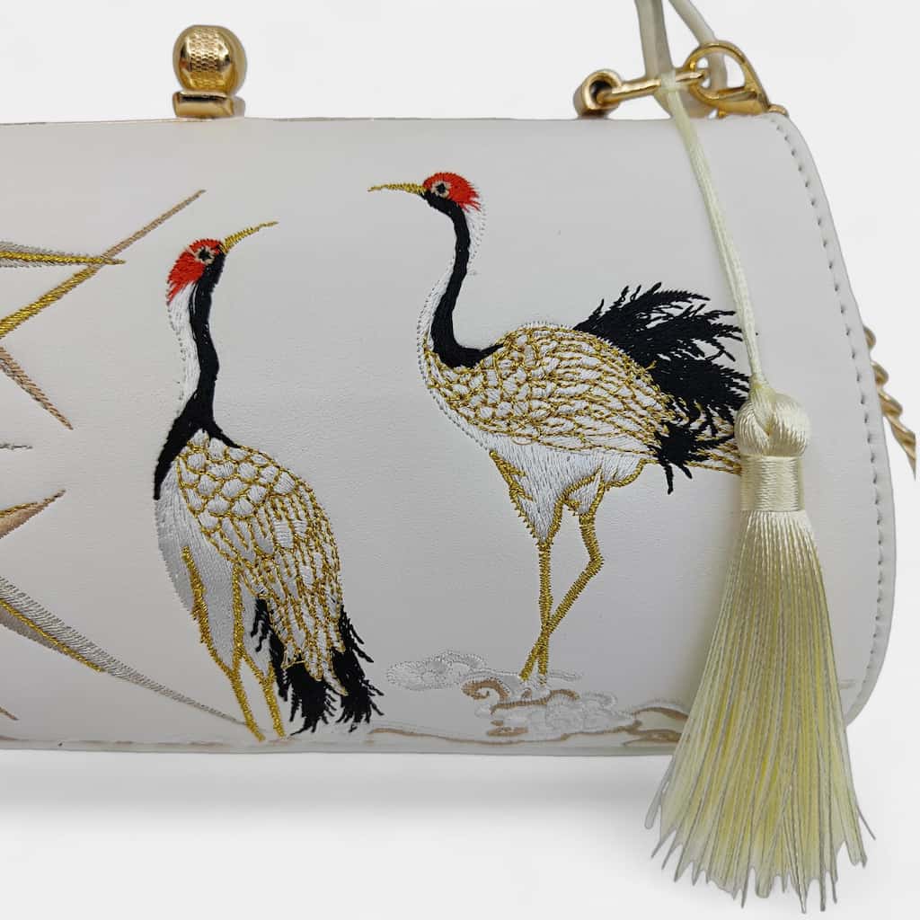 vintage-crane-embroidered-women-barrel-bag-with-tassels-detail