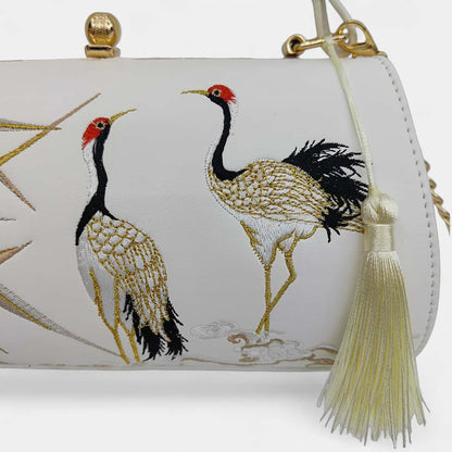 vintage-crane-embroidered-women-barrel-bag-with-tassels-detail