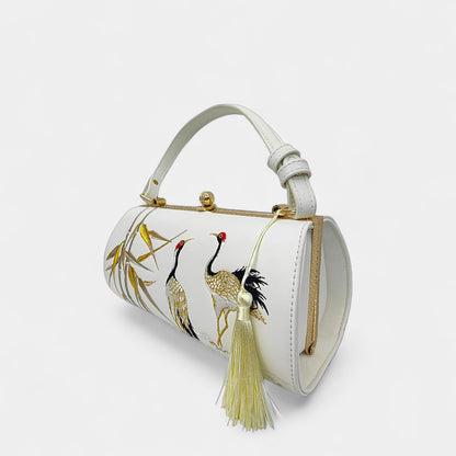 vintage-crane-embroidered-women-barrel-bag-with-tassels-right-front
