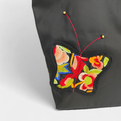 vintage-embroidered-nylon-tote-bag-with-floral-and-butterfly-pattern-detail
